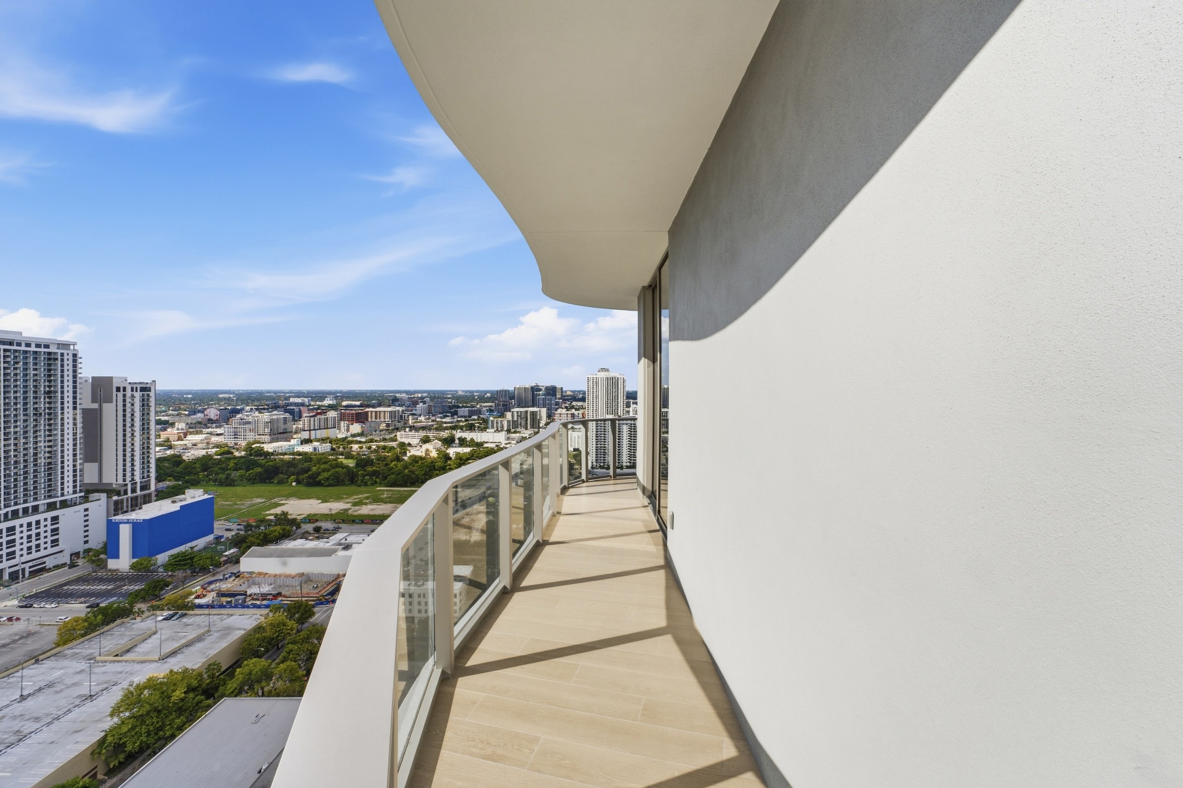 Private balcony wrapping along the residence