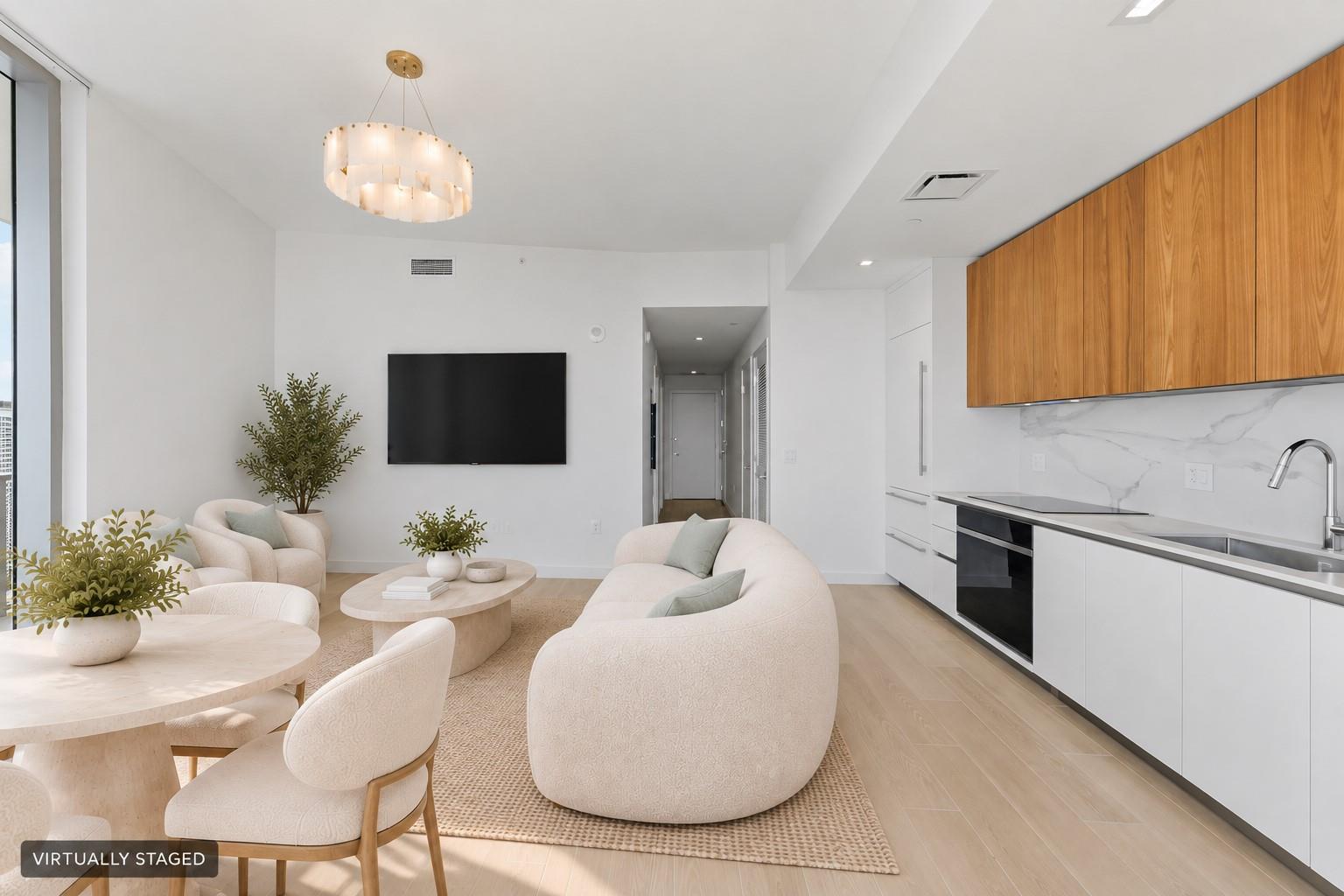 Virtually staged living and dining area viewed toward the kitchen