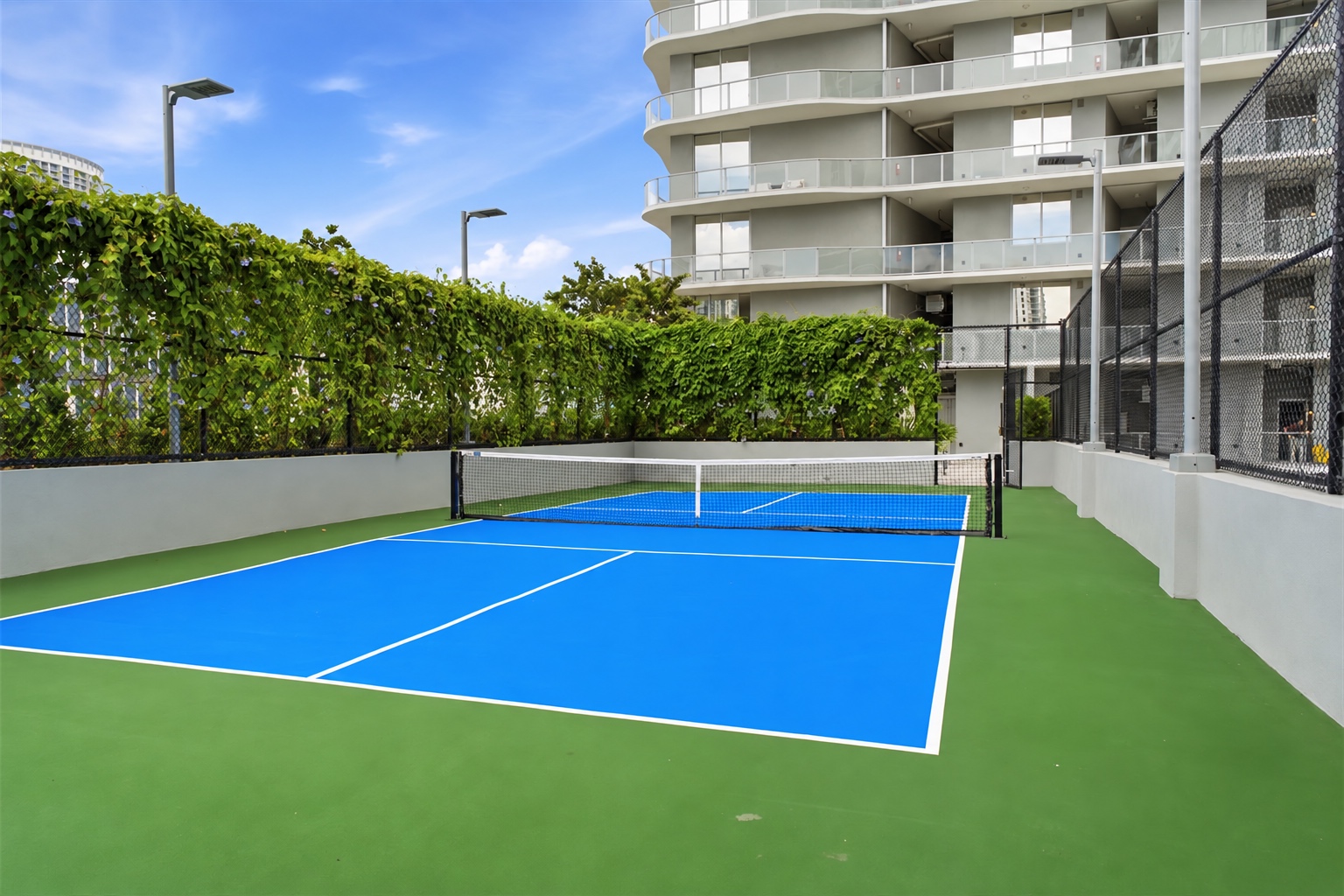 Outdoor pickleball court at Casa Bella Residences