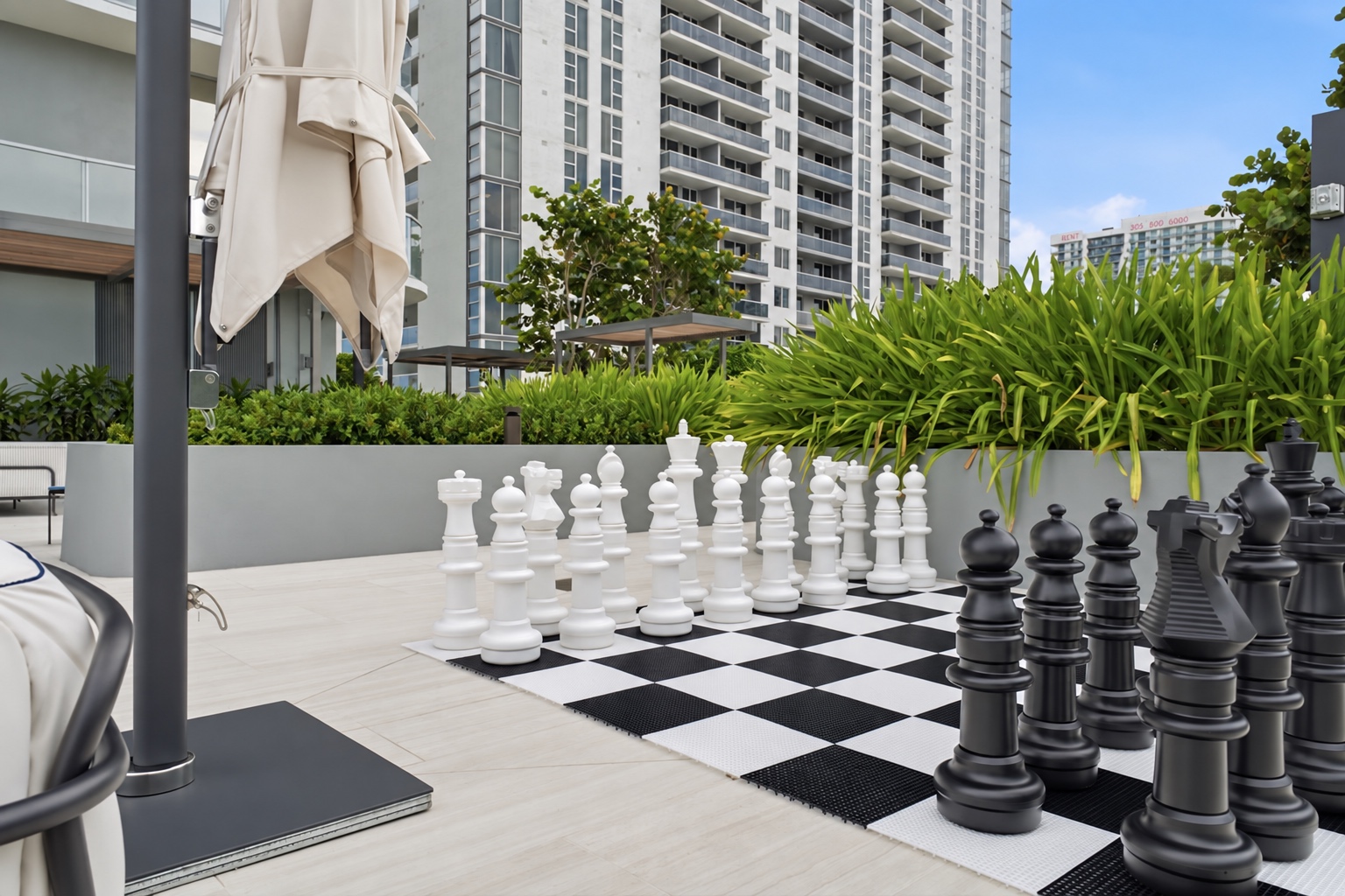 Oversized chess set within the Casa Bella gardens