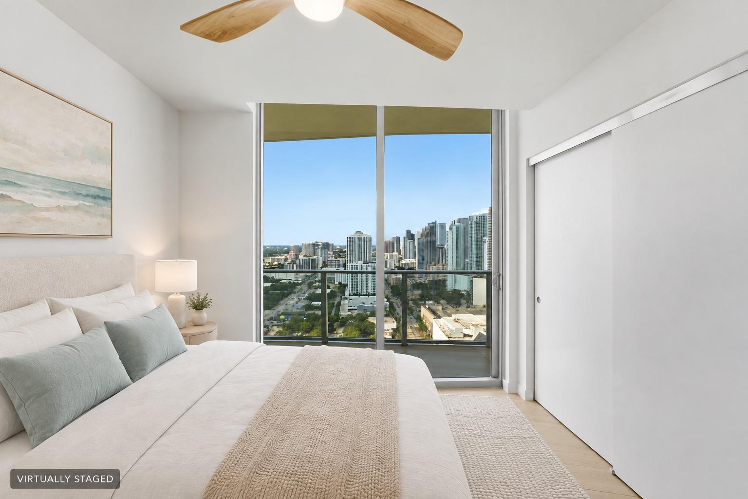 Virtually staged bedroom overlooking Downtown Miami