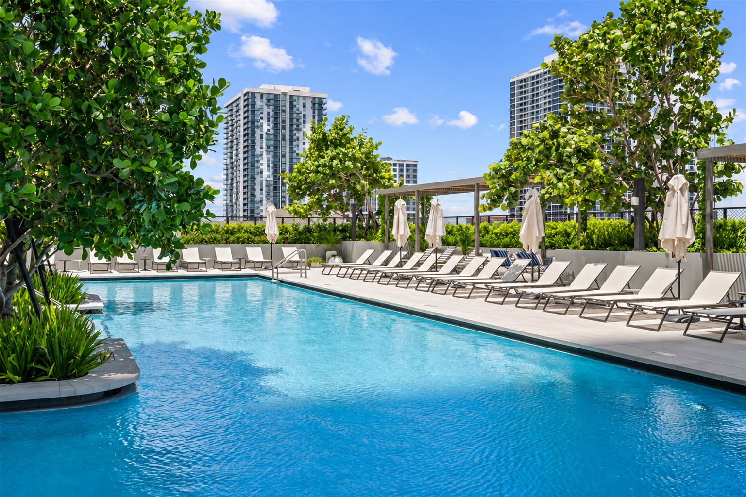 Casa Bella pool surrounded by Italian-inspired gardens